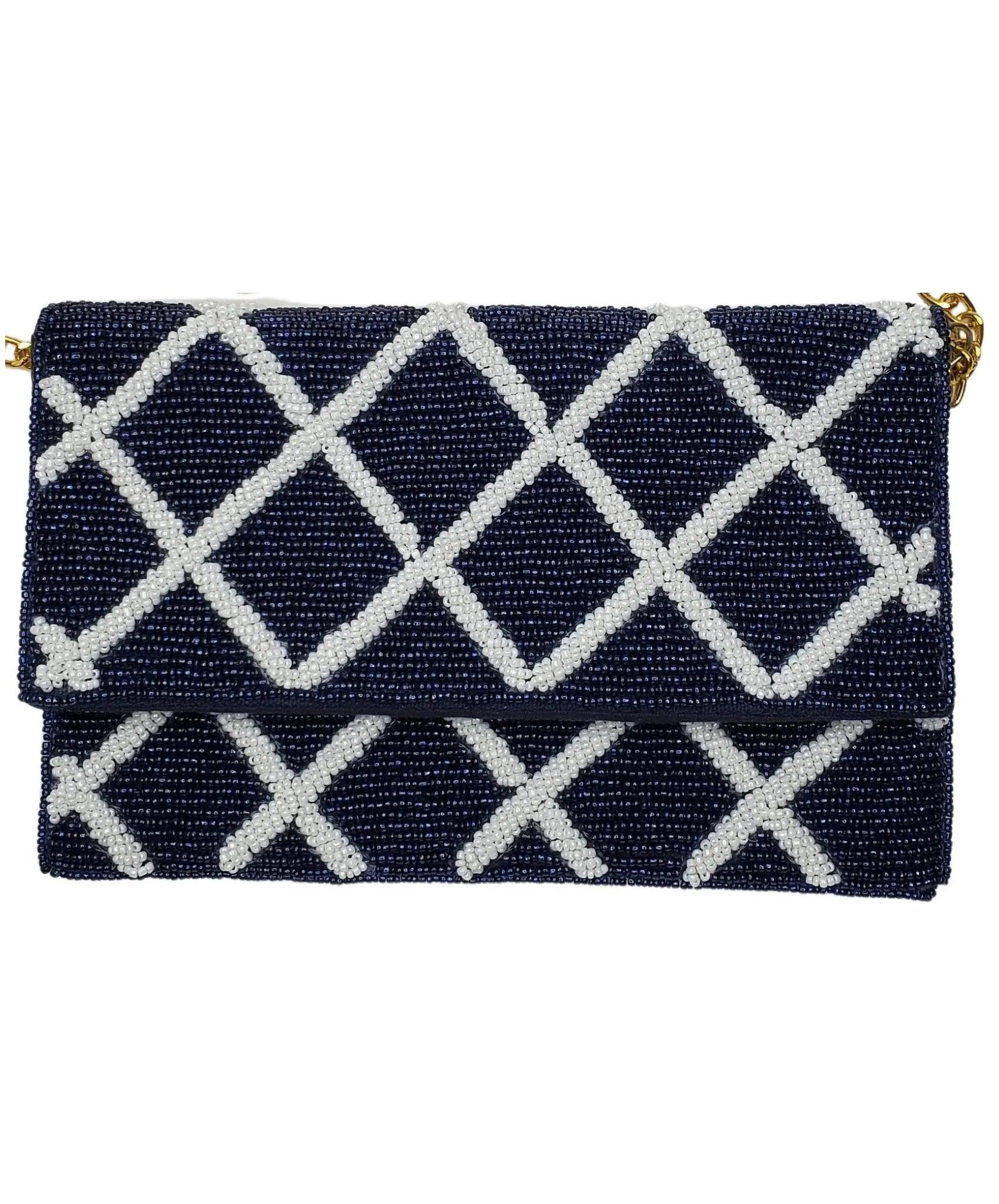 Beautiful navy beaded clutch with white geometric design. Preppy with gold chain.