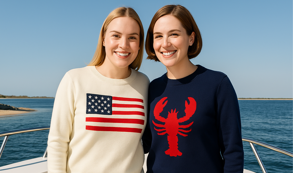 picture of girl holding a dog.  She is wearing a cream sweater with an American Flag on it.