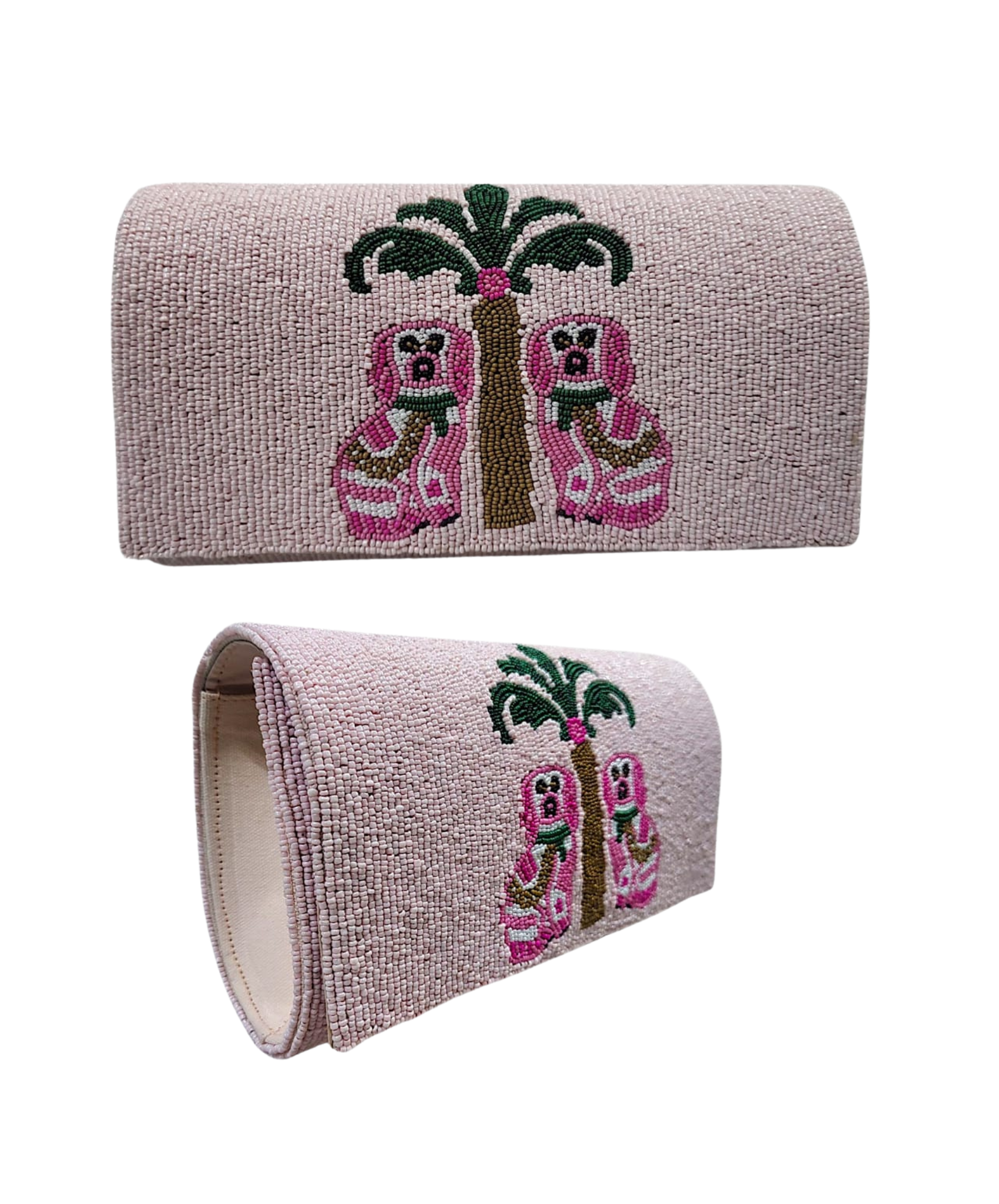 Pale pink beaded clutch with chinoiserie style dalmatian dogs and palm tree design.  Side view of clutch is also showing.
