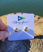 picture of a gold pair of huggie earrings