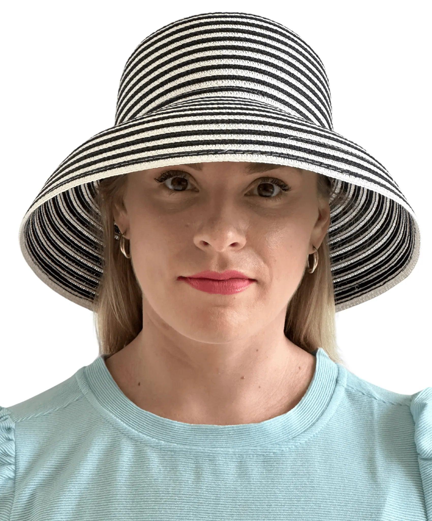 Preppy navy and white striped Hepburn Hat with wide brim for summer sun protection.