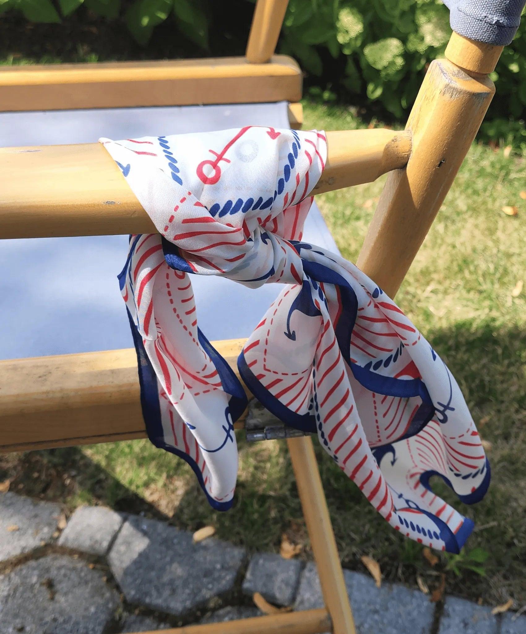picture of red white and blue silk scarf with anchor design.