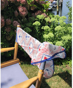 different view of red, white, and blue silk scarf with anchor designs