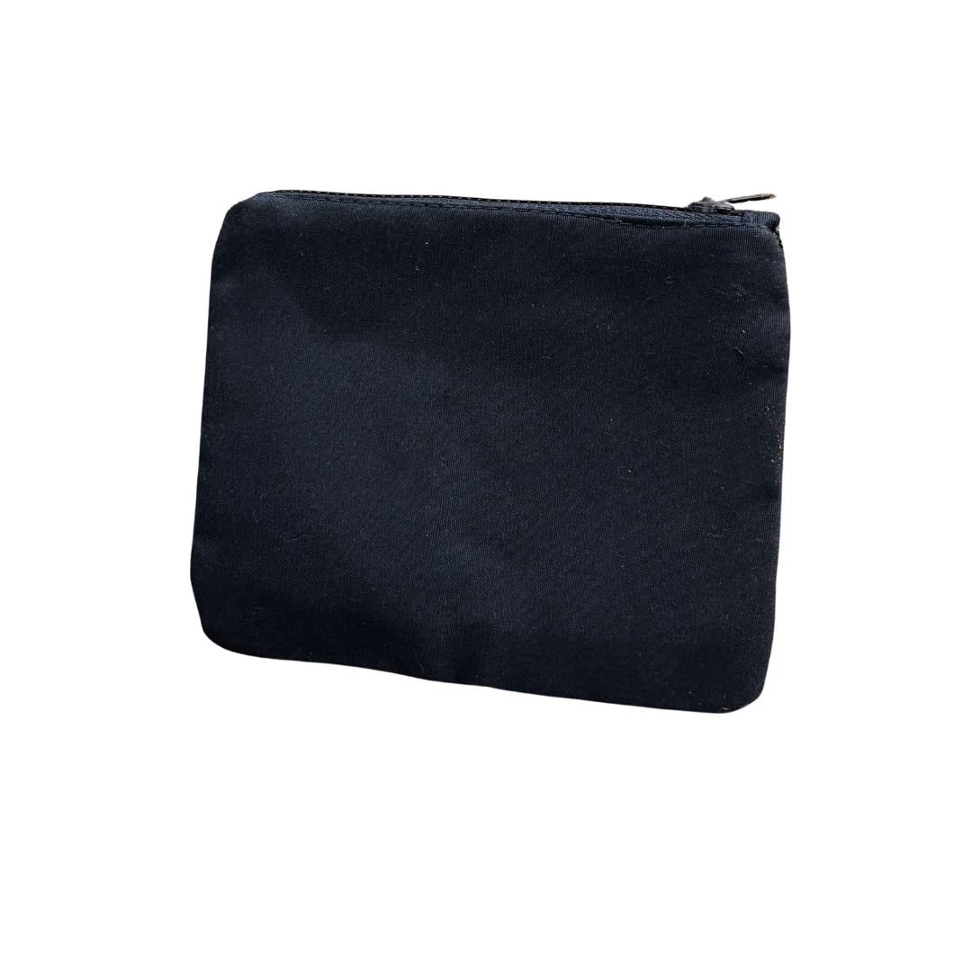 Navy Canvas back side of navy coin purses on a white background
