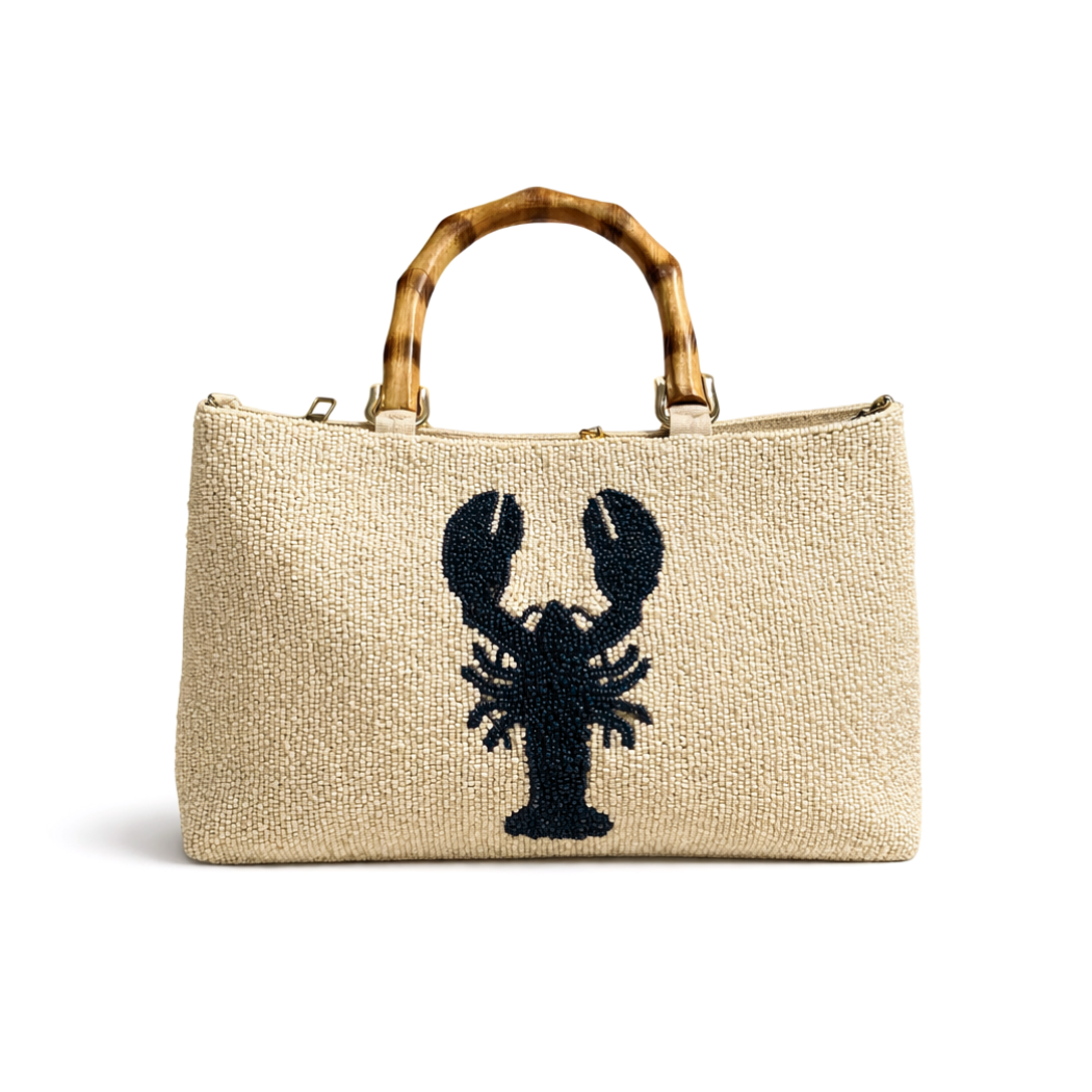 CREAM BEADED LOBSTER BAG WITH BAMBOO HANDLES.  