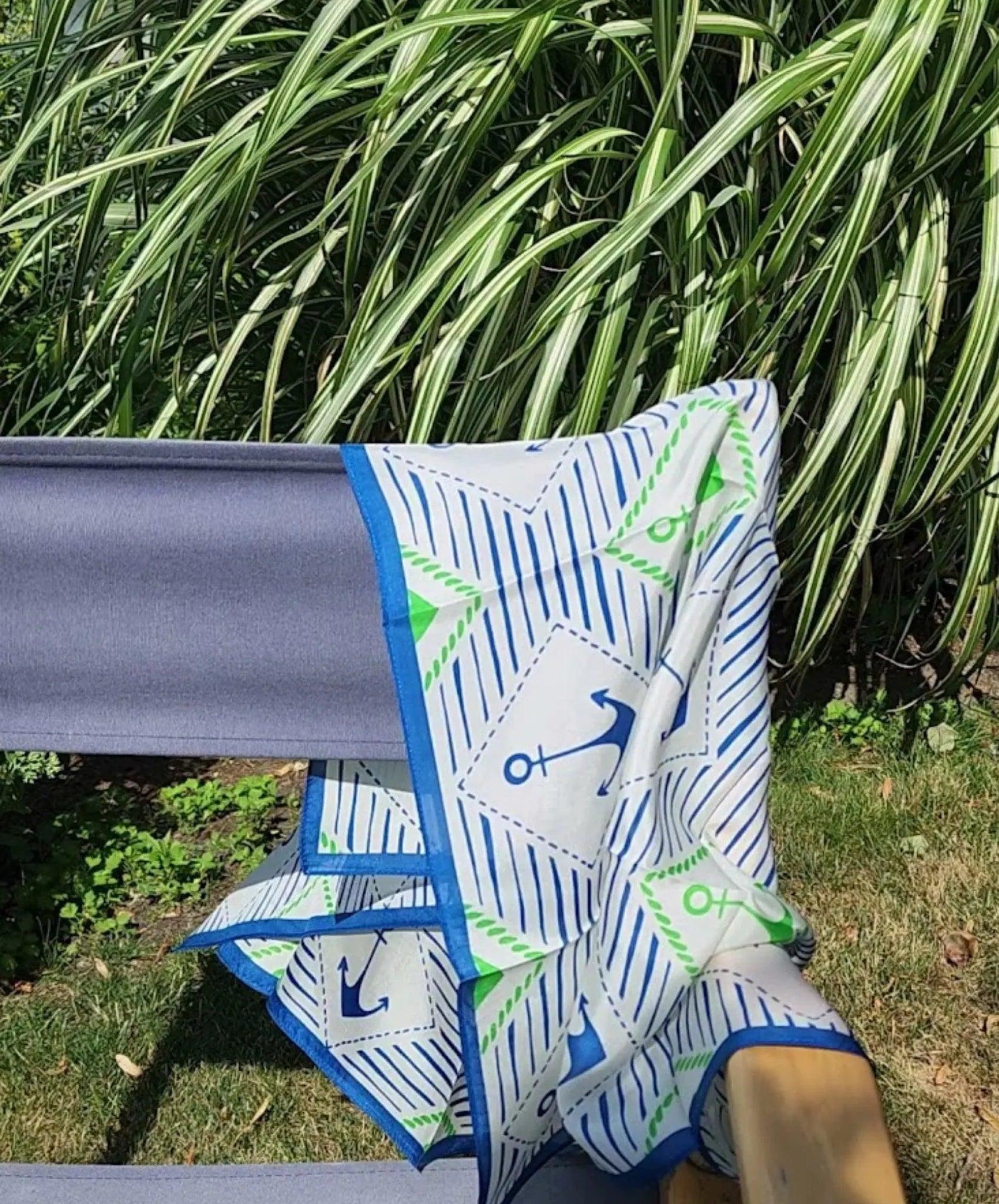 silk scarf with anchor designs.  Navy, green and white. 