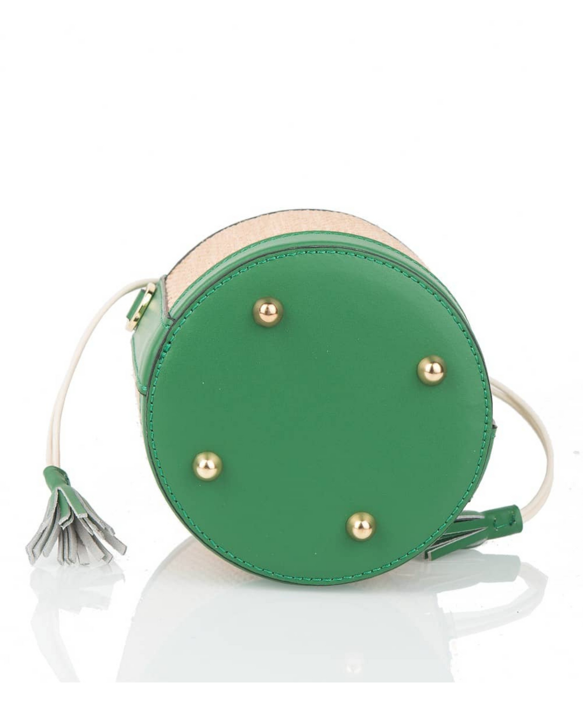 Bottom of raffia bag shown against clean white background.  4 metal feet shown agains green leather.  
