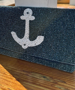 Close up of navy and white beaded clutch 