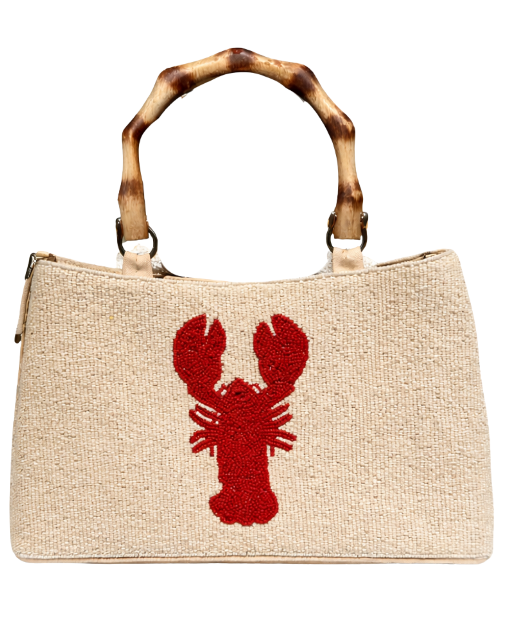Cream handbag with a red lobster design and wooden handle on a white background