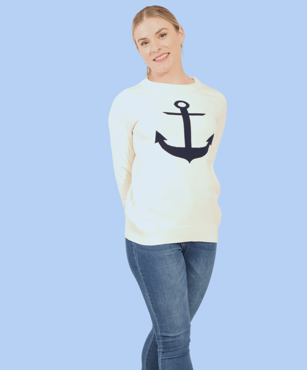 Cream Sweater with Navy Anchor being worn by blonde woman.  Clean white background.
