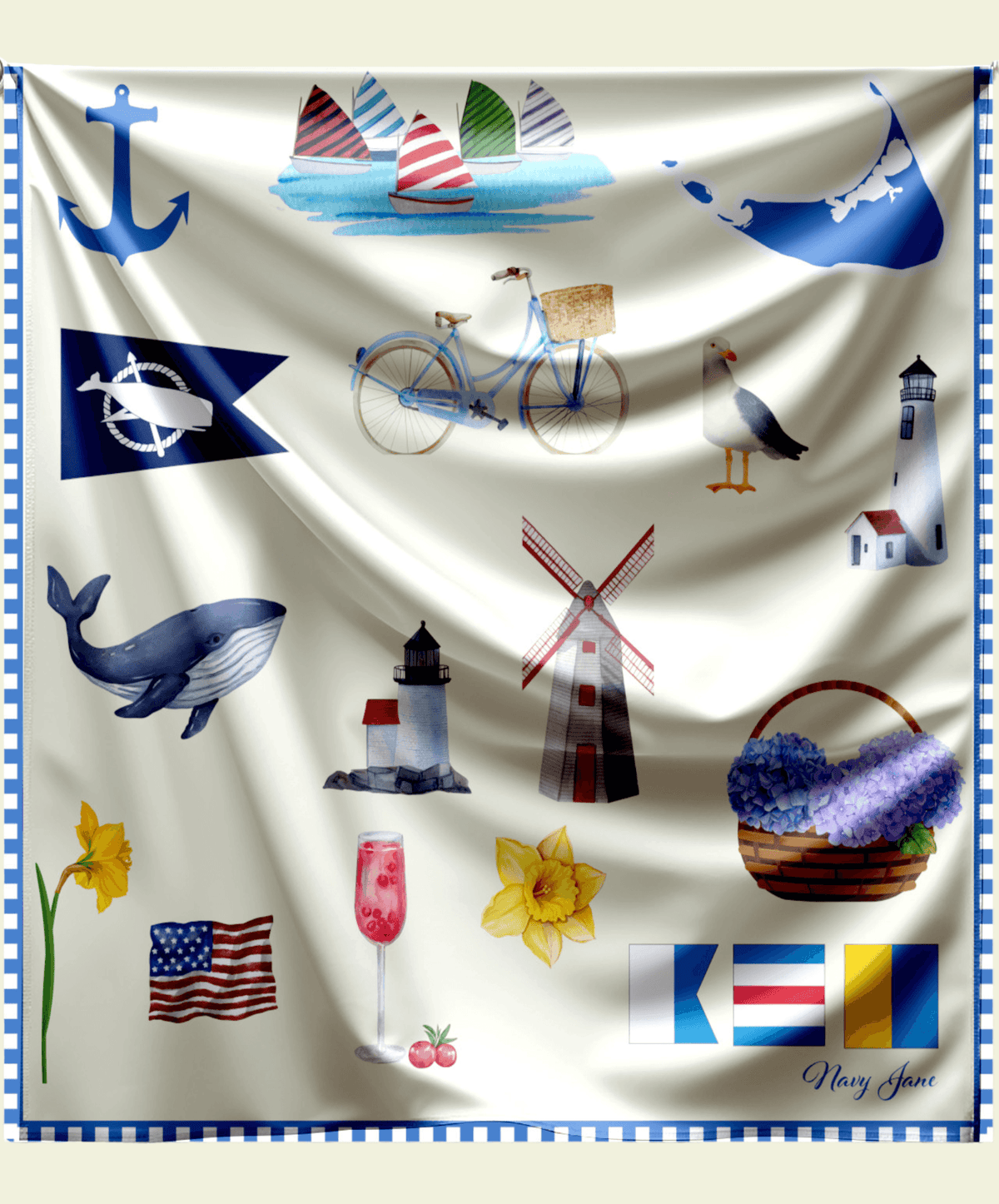 A silk scarf with a Nantucket theme featuring icons such as an anchor, lighthouse, and a bicycle, primarily in blue and white colors.