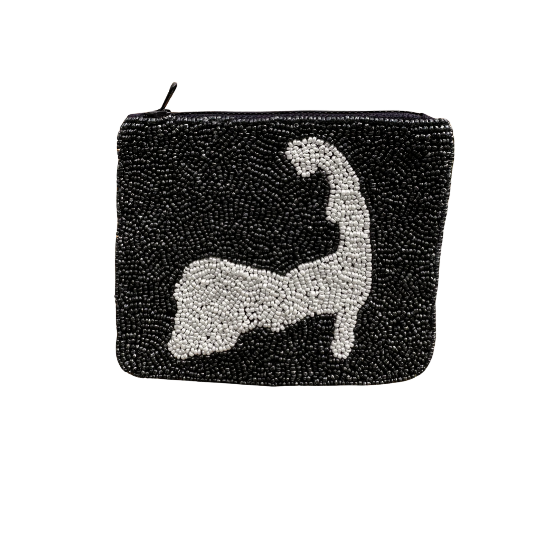 Navy beaded coin purse with white cape cod motif design on white background.