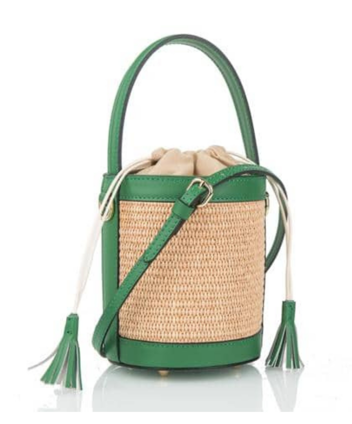 A raffia bucket bag with green leather trim, featuring a natural raffia body, a green leather drawstring closure, and tassel details.