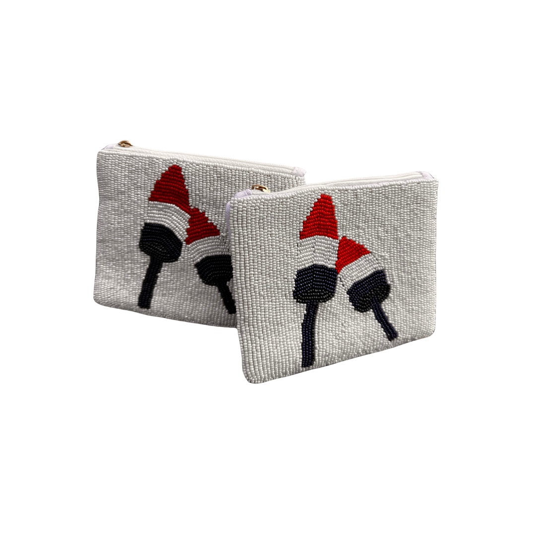 2 white beaded coin purses with  2 red white and blue buoys on a white background.